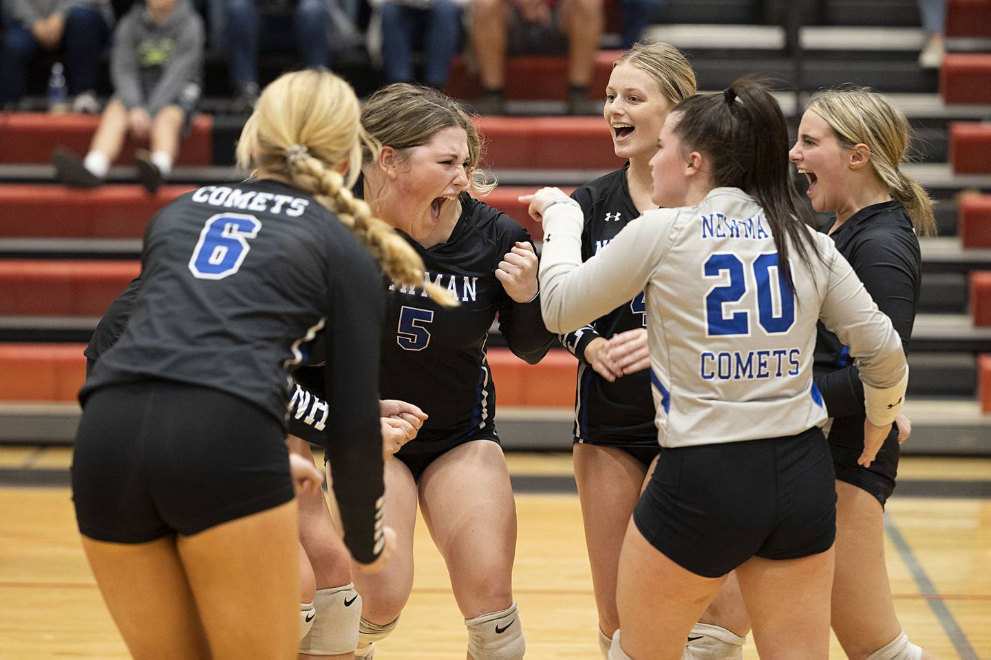 The Newman Comets celebrate a point Wednesday, Nov. 2, 2022 in the sectional championship game against River Ridge.