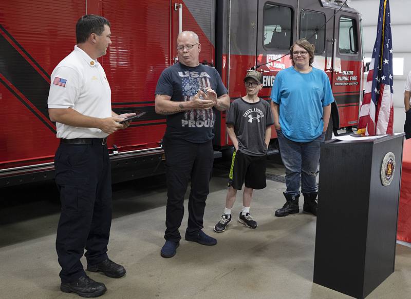 Robert Schiefelbein introduces Dustin Dahlstrom to his two boys, Aiden, 11, and Ronin, 17, on Tuesday, June 11, 2024 in Dixon.