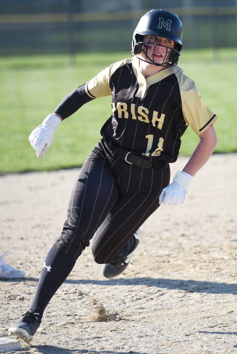 Bishop McNamara's Bridget Bertrand rounds third on her way to scoring a run during a home game against Aurora Christian Tuesday, April 8, 2025.