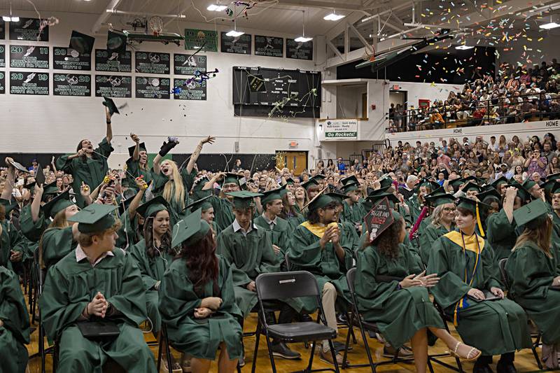 Hats and confetti go airborne as the RFHS class of 2023 is announced Sunday, May 28, 2023.