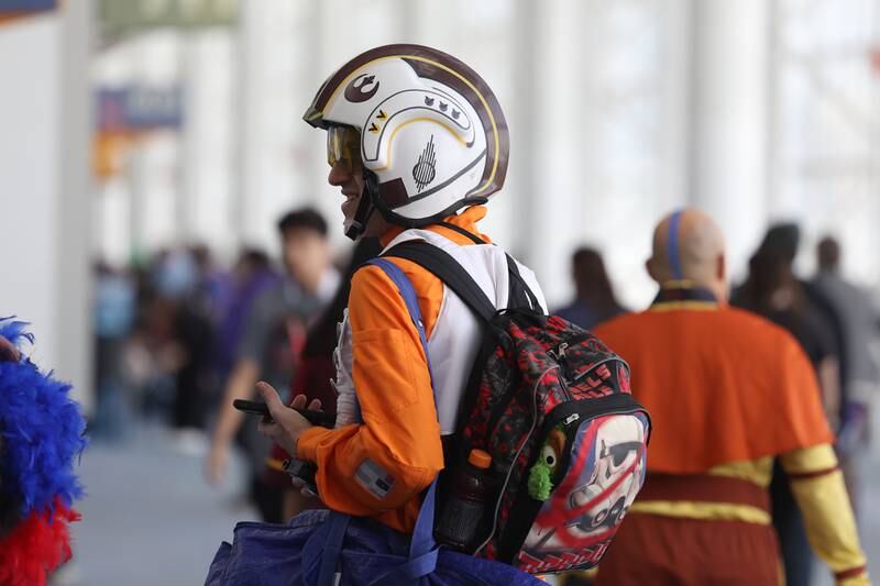 Brian Mika, of Arlington Heights, wears an anti-stormtrooper backpack while dressed as a Star Wars Rebel pilot at C2E2 Chicago Comic & Entertainment Expo on Sunday, April 2, 2023 at McCormick Place in Chicago.