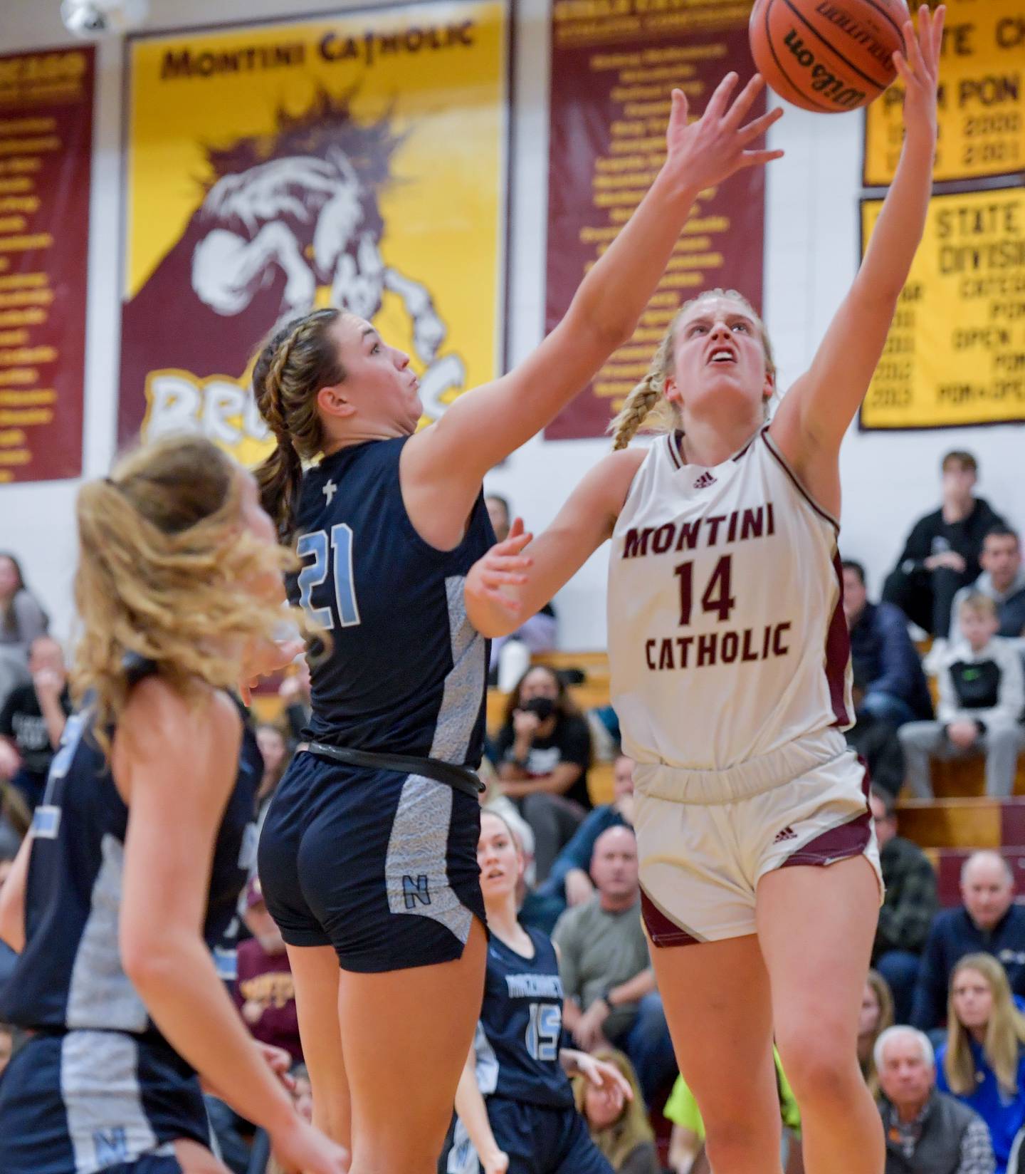 Montini's Shannon Blacher (14) takes a shot against the Nazareth during semifinals of the Montini Catholic Christmas Tournament on Thursday, December 29, 2022.