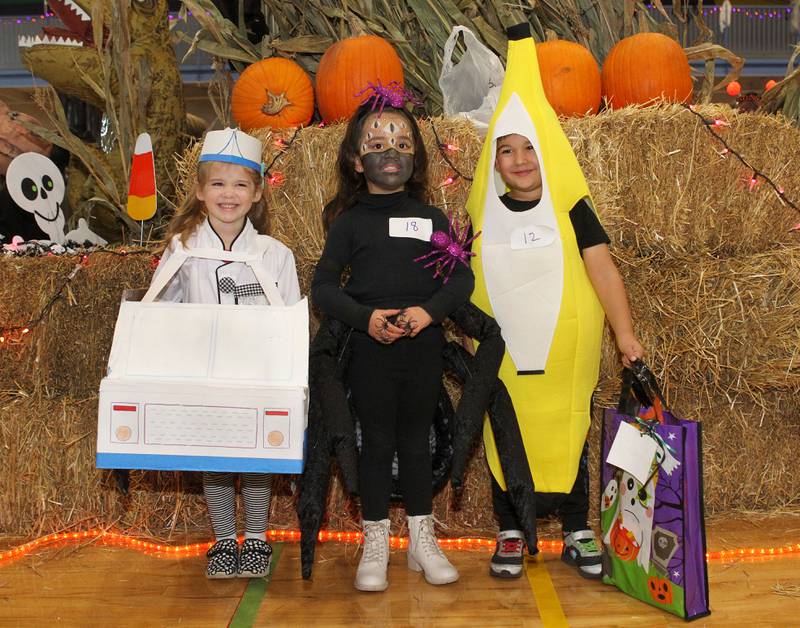 Holly Perley, 3, of Gurnee, (ice cream truck) Charlotte Doxsie (spider queen) and Roman DeLeon, (banana) both 4, of Lindenhurst all stand together after winning the costume contest for 2-5-year-olds during Witchy Thrills & Chills at the Lindenhurst Park District Lippert Community Center on October 14th in Lindenhurst.
Photo by Candace H. Johnson for Shaw Local News Network