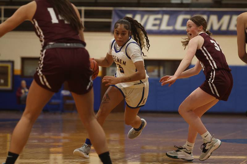 Joliet Central’s Joyce Tua-Link drives to the basket against Lockport.