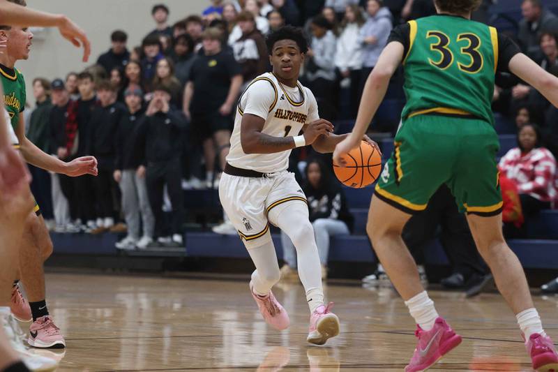 Joliet Catholic’s Jayden Armstrong looks to make a play against Providence on Saturday, Dec. 14, 2024 in Joliet.