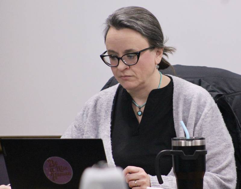 Board Vice President Rachel Cocar reviews material on her laptop prior to the start of the Dixon Public Schools board of education meeting on Wednesday, March 16, 2023.