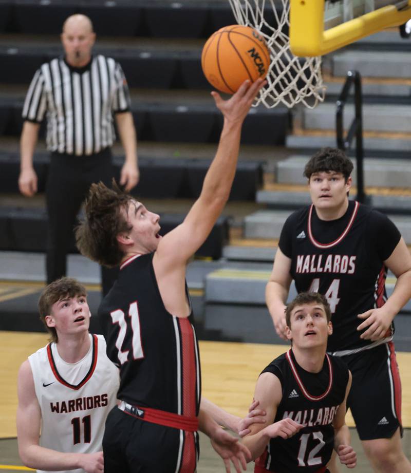 Henry-Senachwine's Landon Harbison scores on a layup against Woodland during the Tri-County Conference Tournament on Monday, Jan. 26, 2026 at Putnam County High School