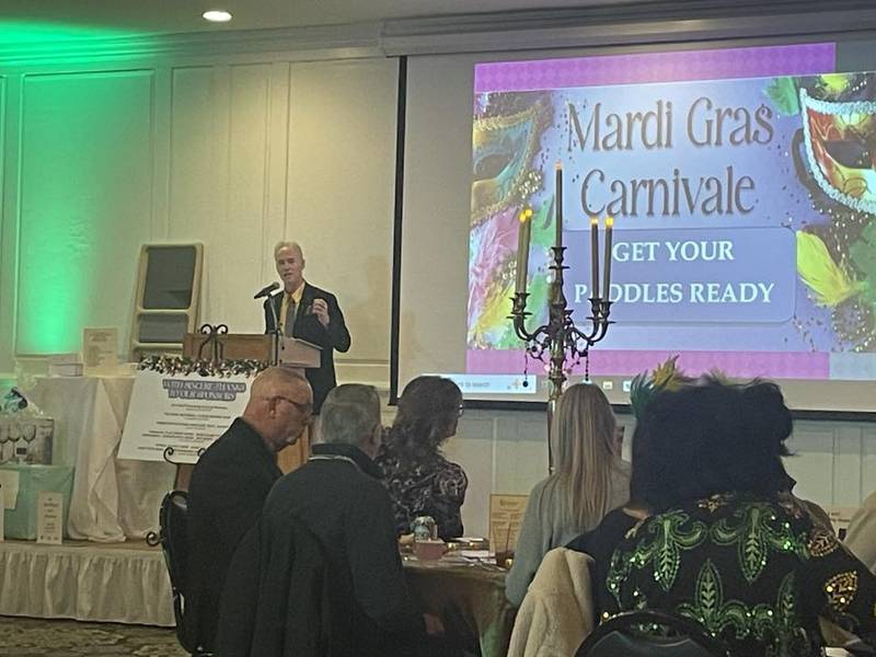 Fran Brolley, CEO of Starved Rock Country Community Foundation, speaks Saturday, March 1, 2025, during the Mardi Gras Carnivale fundraiser at Senica's Oak Ridge in rural La Salle.