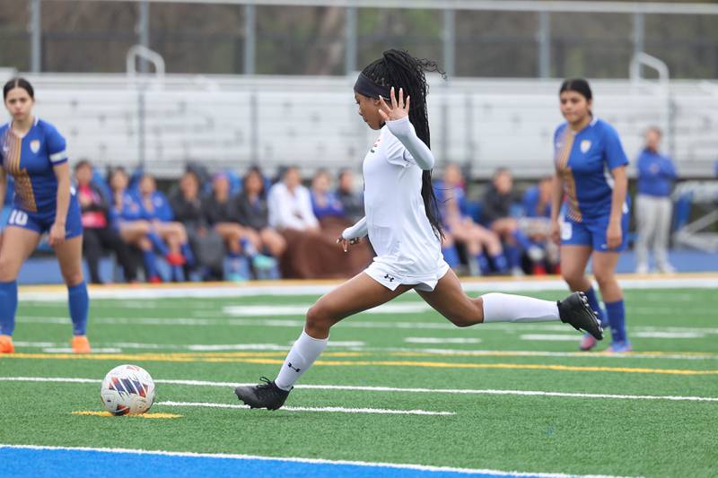 Plainfield East’s Kessiah Purnell takes a penalty shot against Joliet Central on Thursday, April 11, 2024.