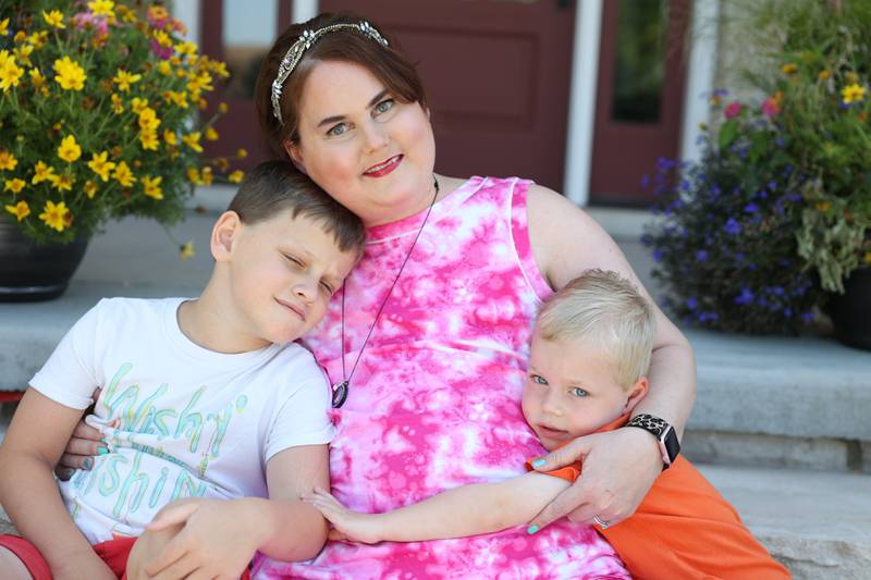 Chiara Robinette sits with her two children, Richard, left, and Henry. Chiara is in the middle of her third fight with breast cancer. Wednesday, June 28, 2022 in Minooka.
