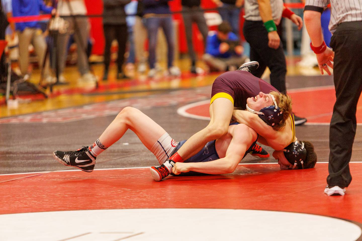 Montini's Erik Klichurov and West Aurora's Gabe Richmond competes in the 113 lb match  at the Hinsdale Central Class 3A Sectional on Saturday, Feb.14,2026 in Hinsdale.
