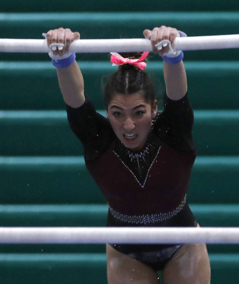 Prairie Ridge’s Maria Kakish competes in uneven parallel bars Wednesday, Feb. 8, 2023, during  the IHSA Stevenson Gymnastics Sectional at Stevenson High School in Lincolnshire.