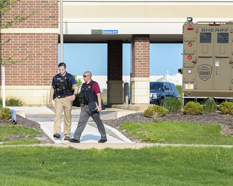 Officers at the scene of a hostage situation on May 10, 2022 at Fifth Third Bank in Romeoville.