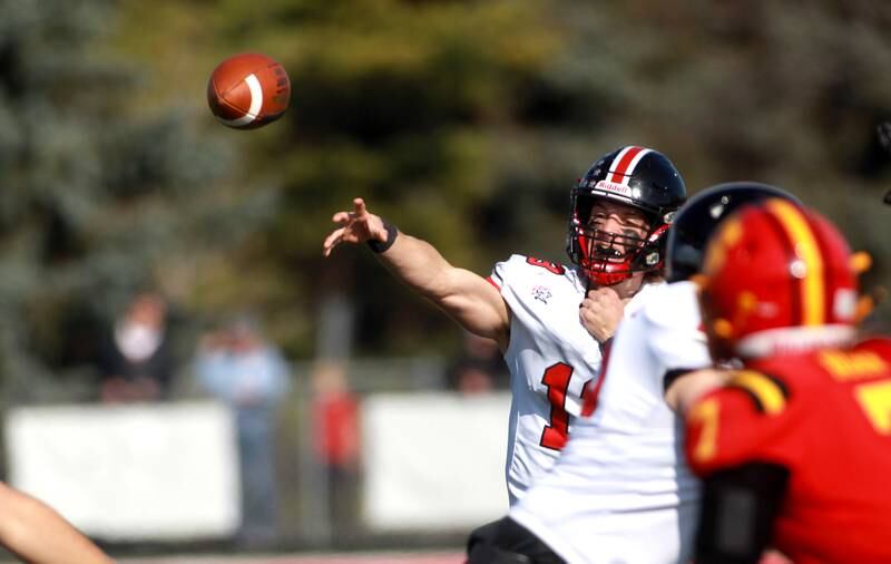 Lincoln-Way Central quarterback Michael Kuehl throws the ball during the Class 7A second round playoff game against Batavia in Batavia on Saturday, Nov. 4, 2023.