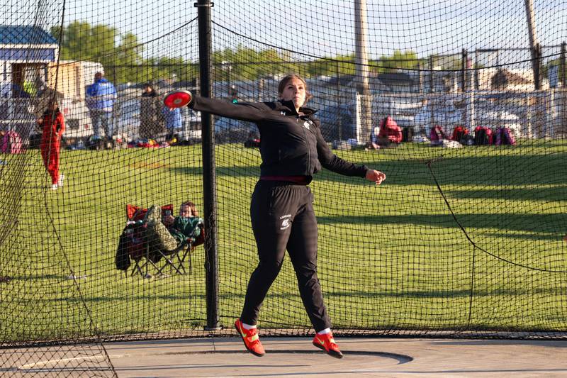 Kankakee's Pyper Krieger throws the discus during the IHSA Class 3A Chicago Heights Girls Track and Field Sectional at Bloom High School on Wednesday, May 13, 2026. Krieger took fourth and qualified for state with a distance of 36.84 meters.