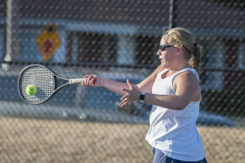 Sterling's Ellie Aitken returns a shot against Sycamore's Ashley Olson Thursday, Sept. 16, 2021.