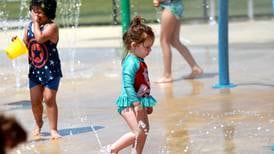 People flocking to Oswego pools, splash pad for relief from summer heat