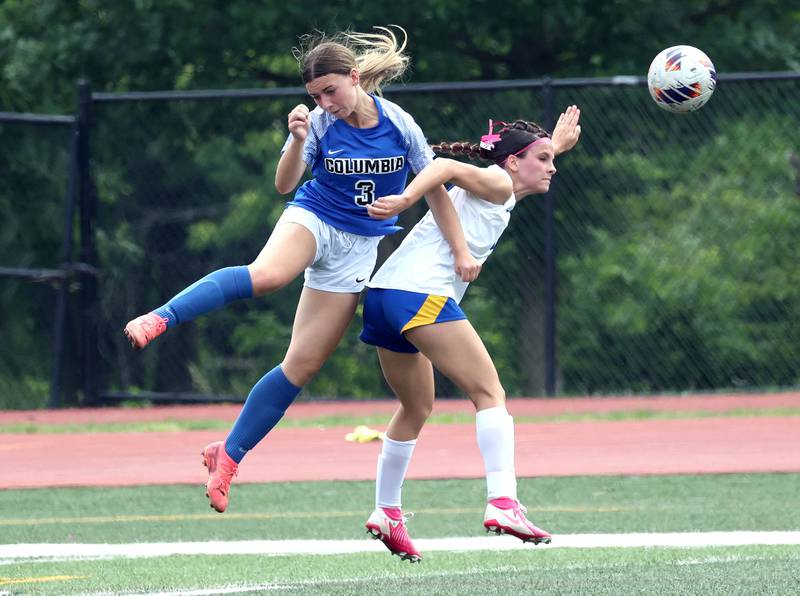 Johnsburg's Liz Smith (right) and Columbia's Cadence Zimmer head the ball Saturday, June 7, 2025, during the IHSA Class 1A state championship game at North Central College in Naperville.