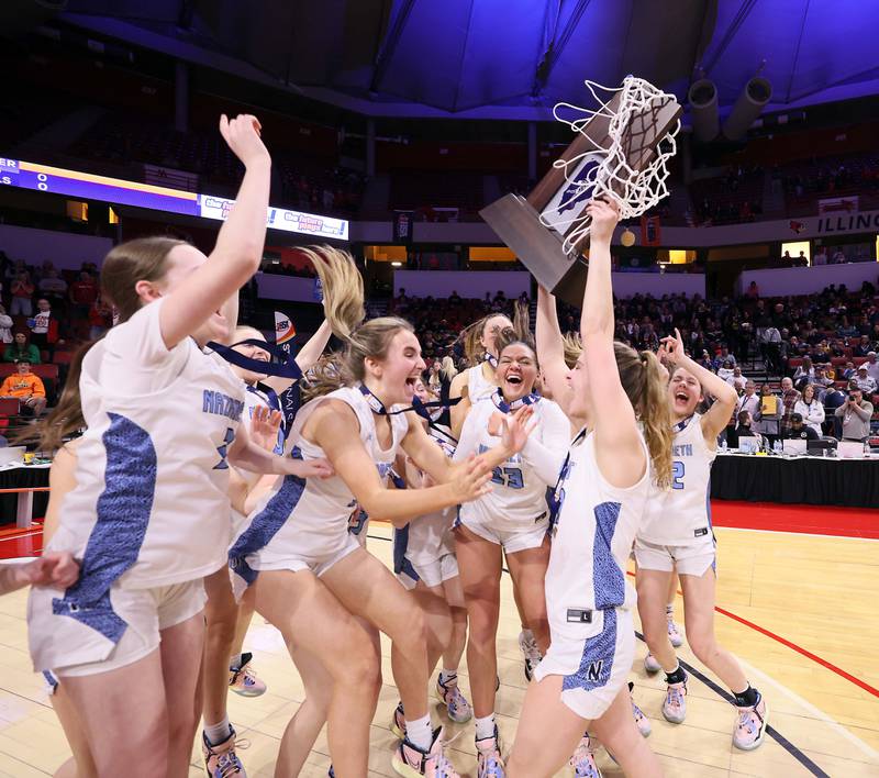 Nazareth Academy celebrates their win over Lincoln during the IHSA Class 3A girls basketball championship game at the CEFCU Arena on the campus of Illinois State University Saturday March 4, 2023 in Normal.