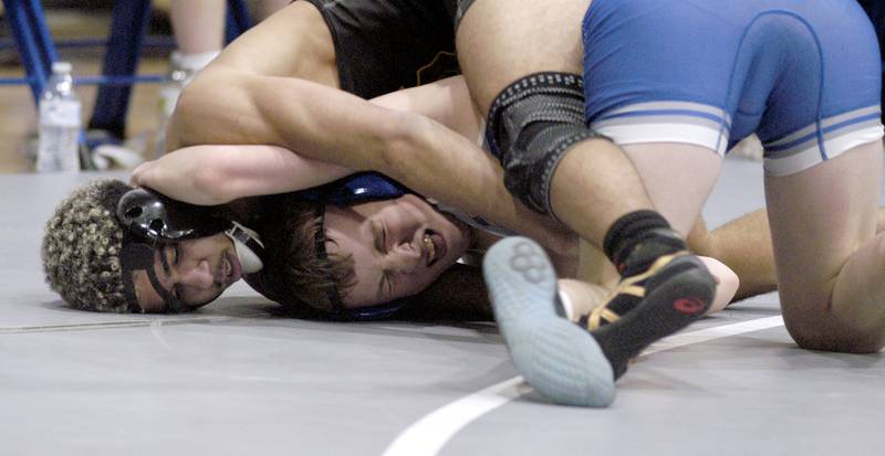 Tegan Arnold of Lena-Winslow and Joel Odell of Princeton lock up. Newman, Princeton and Lena-Winslow grappled at NHS. The meet took place on January 20, 2026.