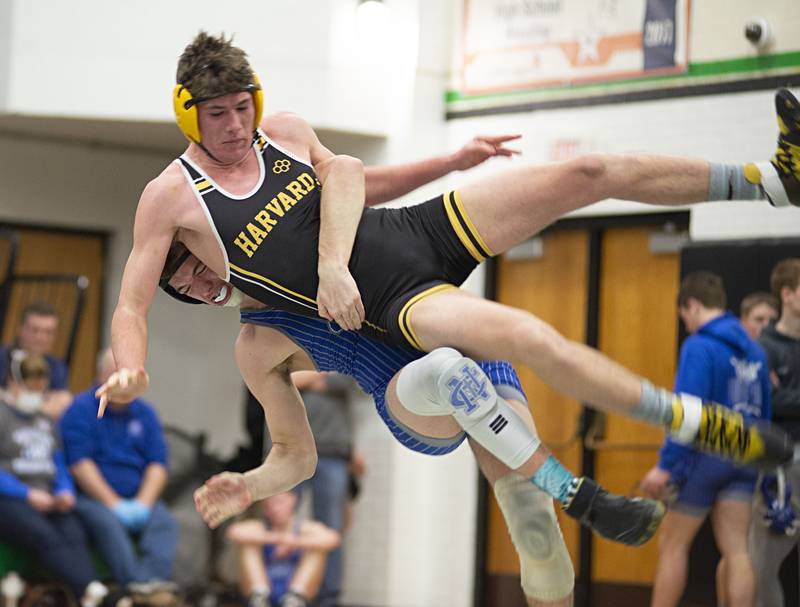 Newman's Mason Glaudel throws Harvard's Kaden Vest at 152lbs in the team wrestling sectional in Rock Falls on Tuesday, Feb. 22, 2022.