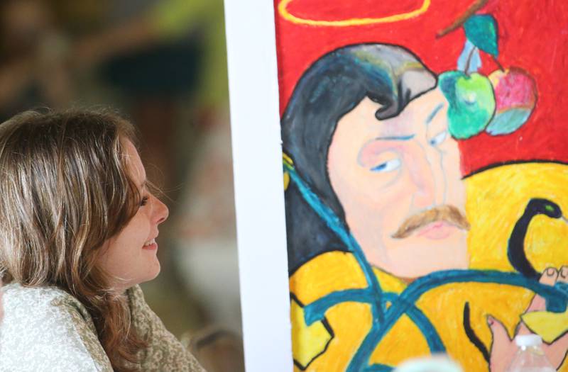 Kendra Story of Henry, smiles while having her painting judged during the Marshall-Putnam County 4-H Fair on Wednesday, July 23, 2025 at the Marshall-Putnam Fairgrounds in Henry.
