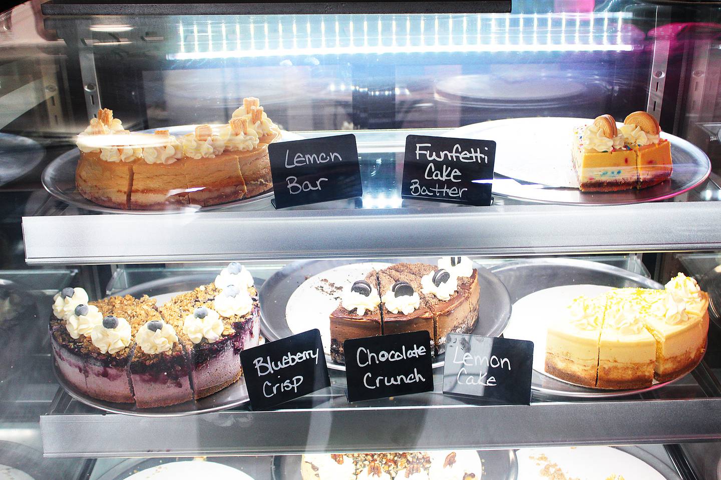 Since opening on Nov. 2, 2024, CheeseKake Ko.'s downtown Ashton store has buzzed with activity, with many customers taking time to peer through its glass case to see what satisfies their palates.