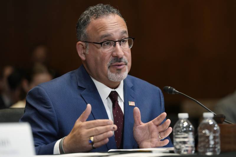 FILE - Education Secretary Miguel Cardona testifies during a Senate Appropriations Subcommittee on Labor, Health and Human Services, and Education, and Related Agencies hearing on Capitol Hill in Washington, April 30, 2024. The Biden administration is cancelling student loans for another 160,000 borrowers through a combination of existing programs. (AP Photo/Susan Walsh)