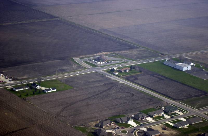 An aerial looking northeast near the intersection of North 29th Road (Wenzel Road) and Marquette Road on Wednesday, Jan. 6, 2005. The bottom street with the cul-de-sac is 34th Street.