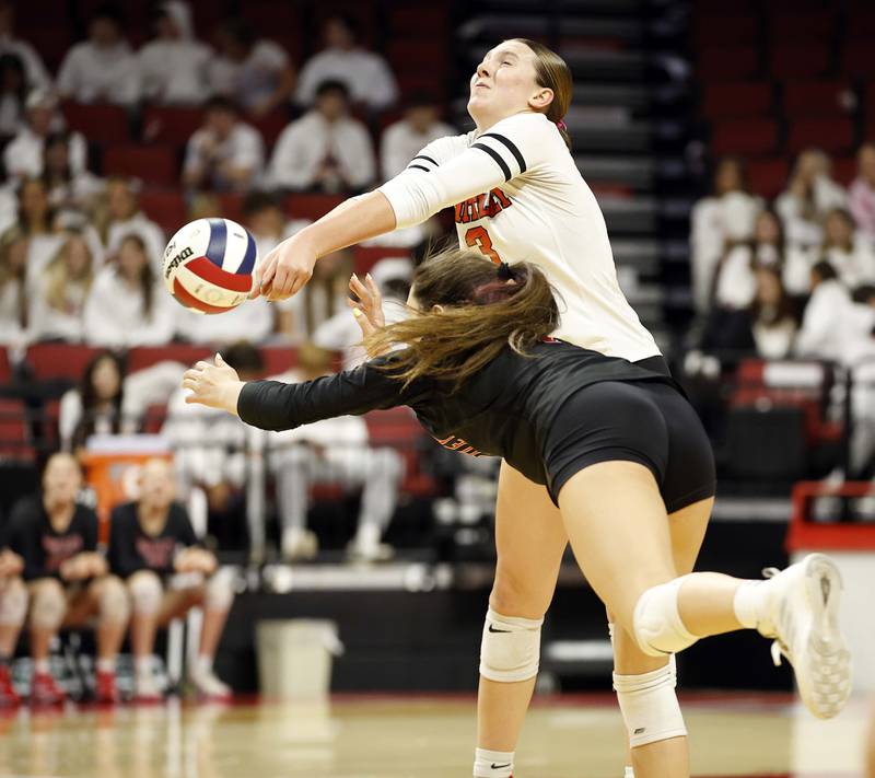 Huntley's Alex Goritz (3) and Mari Rodriquez (9) almost collide during the IHSA Class 4A girls volleyball third place match Saturday, Nov. 16, 2024 at CEFCU Arena in Normal.