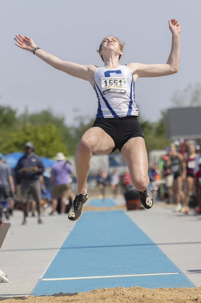 Burlington Central’s Paige Greenhagel lands her 2A long jump Saturday, May 20, 2023 during the IHSA state track and field finals at Eastern Illinois University in Charleston.