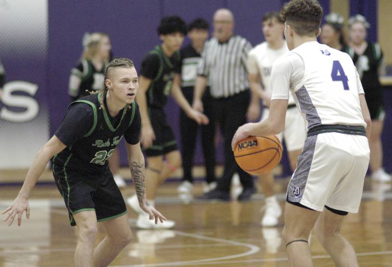 Rock Falls Nehemiah Menendez challenges Dixon's rody Nicklaus. Dixon hosted Rock Falls in boys basketball Friday, February 14, 2025 at Lancaster Gym at Dixon High School. Rock Falls won a hard fought game 48-46.