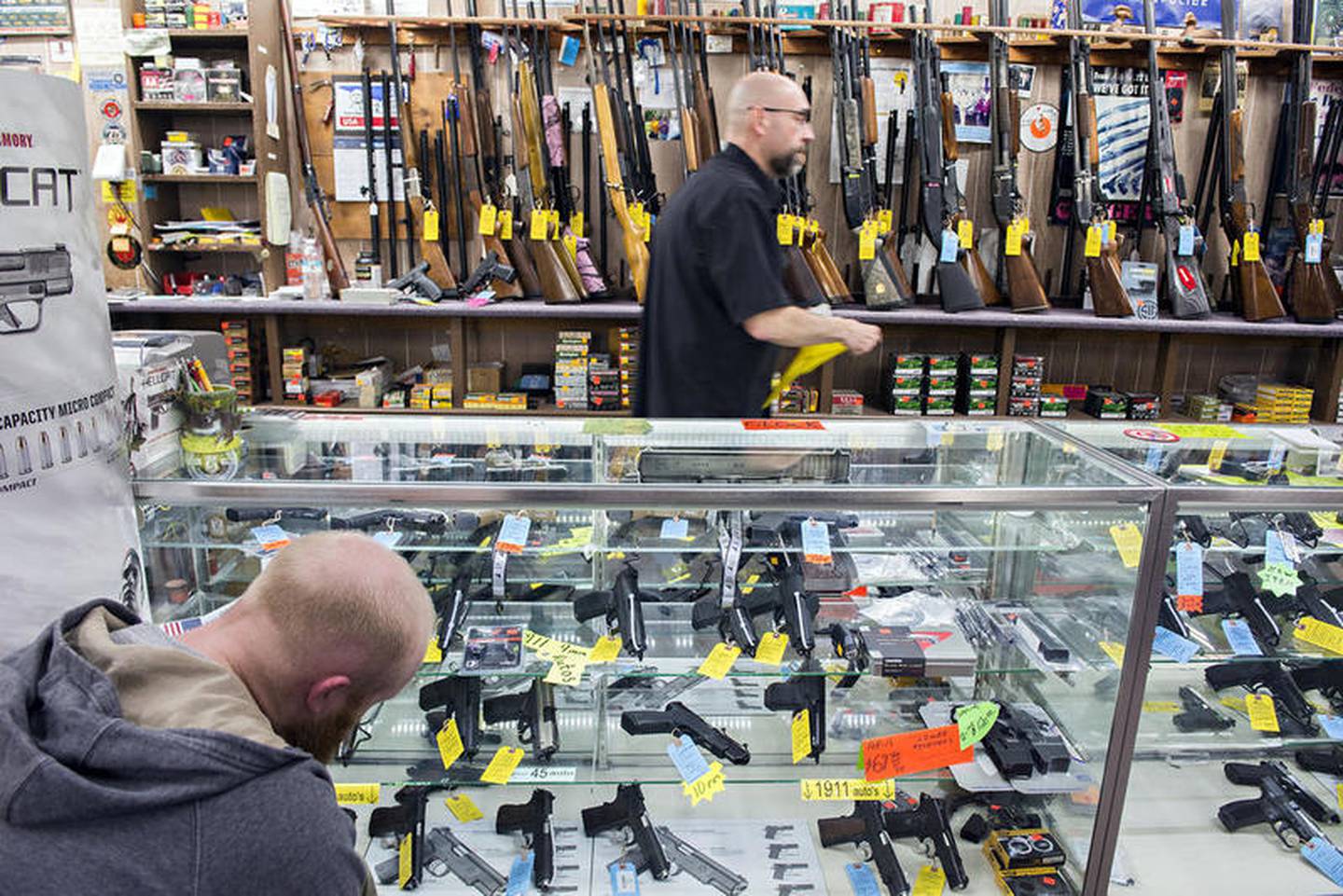 Ed Branch, shown here in a Shaw Media file photo, has been a sales associate at Rigler’s Sporting Goods in Rock Falls for 21 years of the more than 50 years the store has been in business. He is opposed to the changes proposed in a measure filed in the Illinois General Assembly that would ban high-powered semi-automatic weapons.