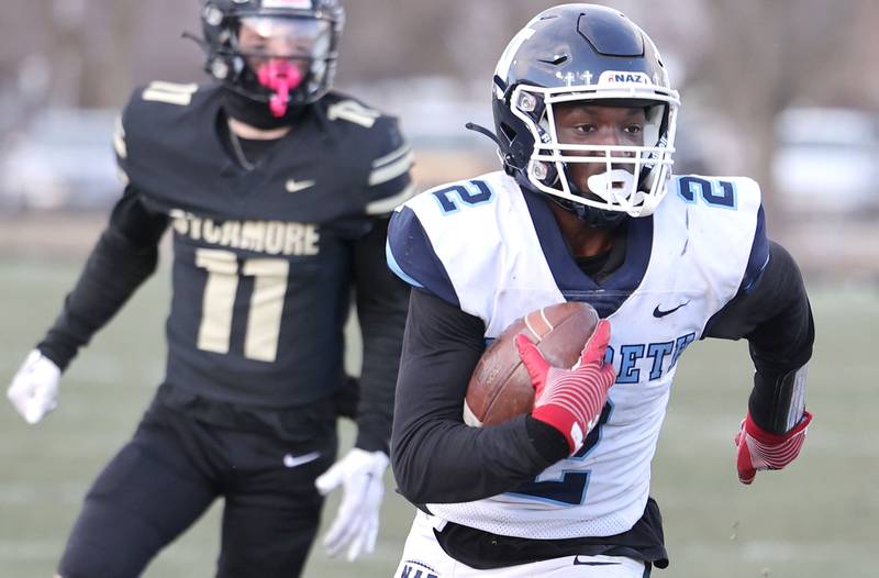 Nazareth's Justin Taylor gets behind the Sycamore defense for a big gain late in the fourth quarter Saturday, Nov. 18, 2022, during their state semifinal game at Sycamore High School.