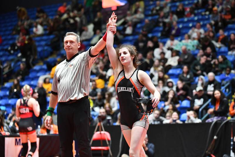 Angelina Gochis of Kaneland celebrates her victory in the 110-pound championship match in the IHSA Girls Individual State Finals on Saturday, March 1. Gochis took first place over Annalee Aarseth of Crystal Lake South.