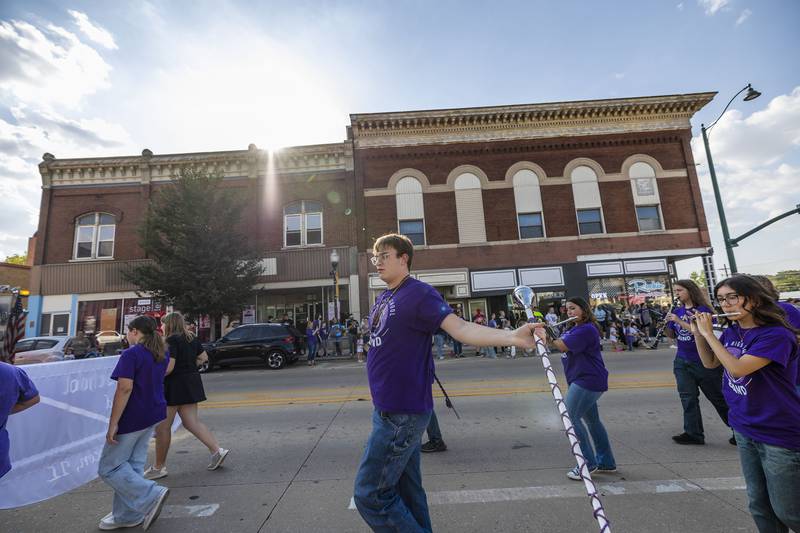 The Dixon High School marching band leads the homecoming parade through the downtown Friday, Oct. 3, 2025. King and Queen honors will be announced at tonight’s football game.