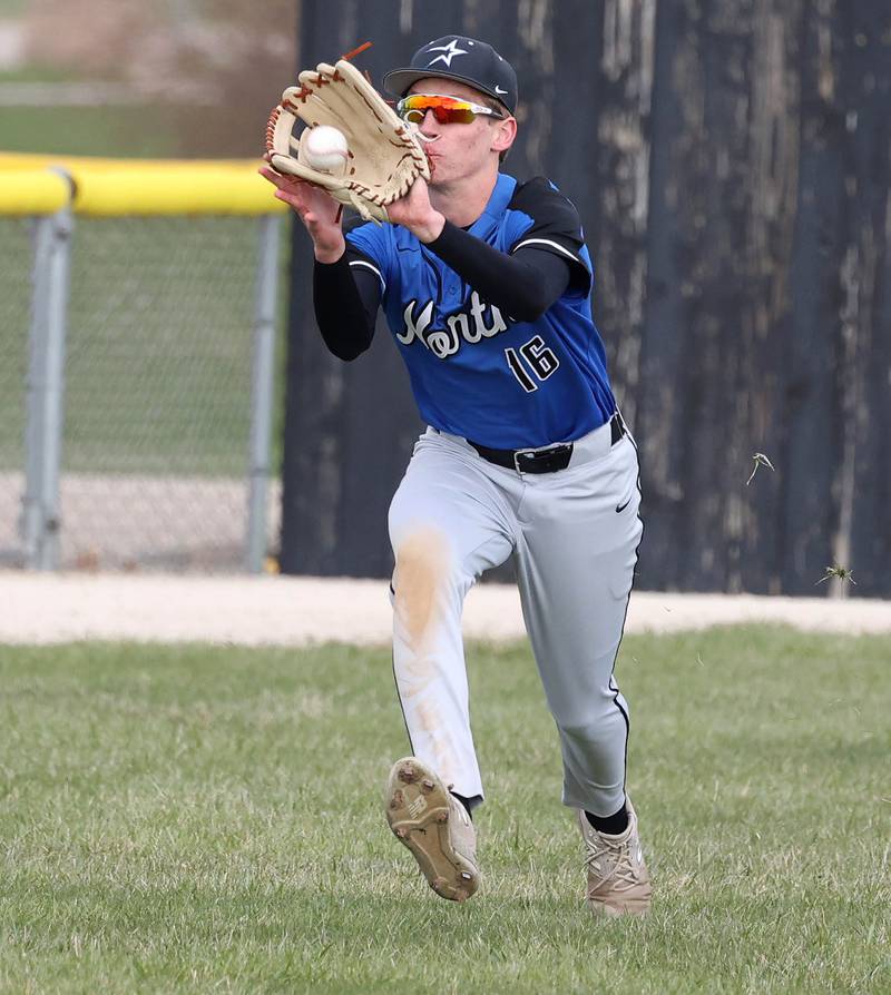 St. Charles North's Henry Grimm catches a sinking line drive in the outfield during their game against Sycamore Thursday, April 10, 2025, at the Sycamore Park District Sports Complex.
