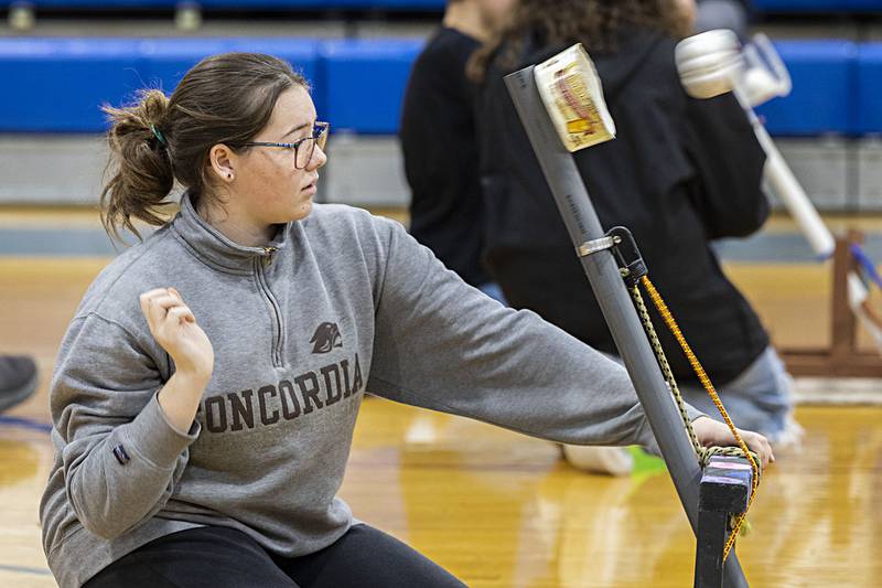 Abbie Baldwin, seventh grader, launches her pumpkin projectiles on Thursday, Dec. 8, 2022.