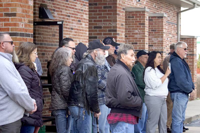 Attendees at the flag ceremony for Veterans Day at the Stone City VFW Post 2199, 124 Stone City Drive, Joliet, on Tuesday, Nov. 11, 2025.