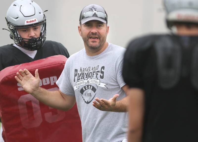 New Kaneland football head coach Michael Thorgesen instructs players during practice Wednesday, Aug. 9, 2023, at the school in Maple Park.