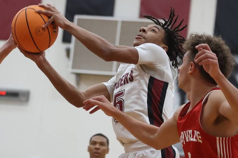 Plainfield North’s Darin Ashiru goes in for the basket against Naperville Central on Wednesday, Jan 22, 2025 in Plainfield.
