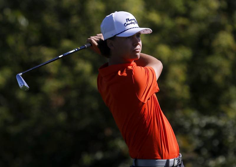 Crystal Lake Central Asher Johnson watches his tee shot on the 10th hole during the Fox Valley Conference Boys Golf Tournament Wednesday, Sept. 25, 2024, at RedTail Golf Club in Lakewood.