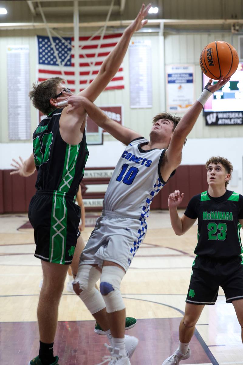Clifton Central's Blake Chandler looks to shoot under pressure from Bishop McNamara's Callaghan O'Connor during the Fightin' Irish's 62-41 victory in the Watseka Holiday Tournament championship on Tuesday, Dec. 16, 2025.