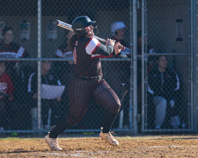 Yorkville's Kayla Kersting (10) admires her homerun during softball game between Benet at Yorkville.  April 5th, 2024.