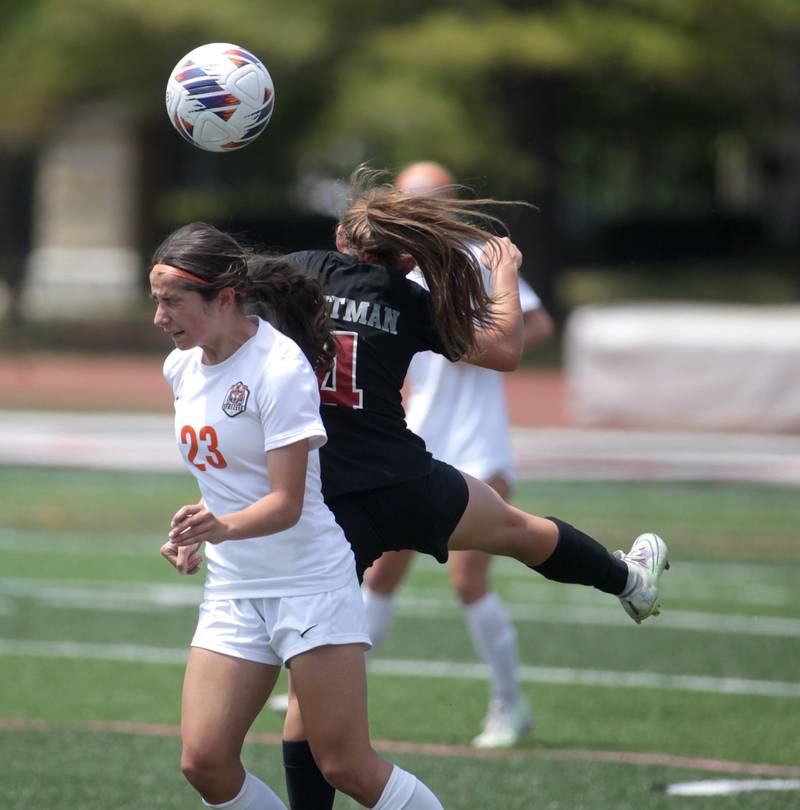 Crystal Lake Central’s Addison Schaffer and Benet’s Chloe Sentman head the ball during a Class 2A girls state soccer semifinal at North Central College in Naperville on Friday, June 2, 2023.