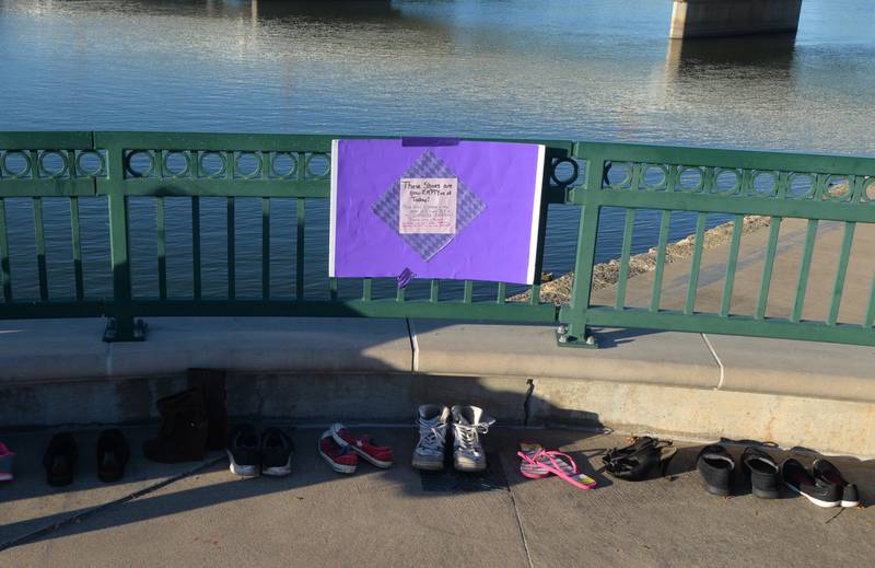 Ten pairs of empty shoes were displayed at the Sauk Valley Voices of Recovery Overdose Awareness event in Dixon on Thursday, Aug. 31, 2023 to show that at least 10 people are lost to overdose every day in Illinois.