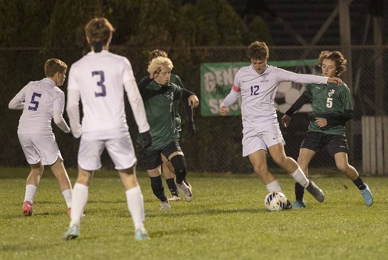 Dixon’s Quinn Flanagan handles the ball against Geneseo Wednesday, Oct. 23, 2024, during the class 2A soccer regional in Geneseo.