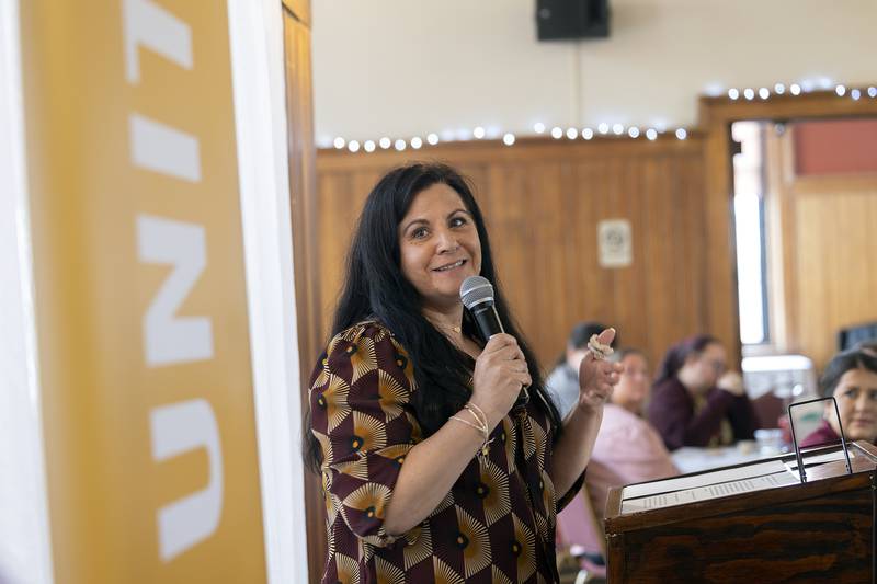 YWCA Executive Director Rebecca Munoz-Ripley accepts the Partner Agency of the Year award Thursday, May 1, 2025, from the Lee County United Way.