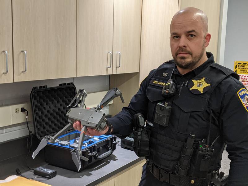 Yorkville Police Sgt. Chris Hayes shows off one of the drones that the department uses.