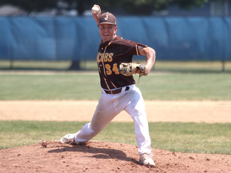 Jacobs’ Anthony Edge delivers against Hononegah in Class 4A Sectional baseball action at Carpentersville Saturday.
